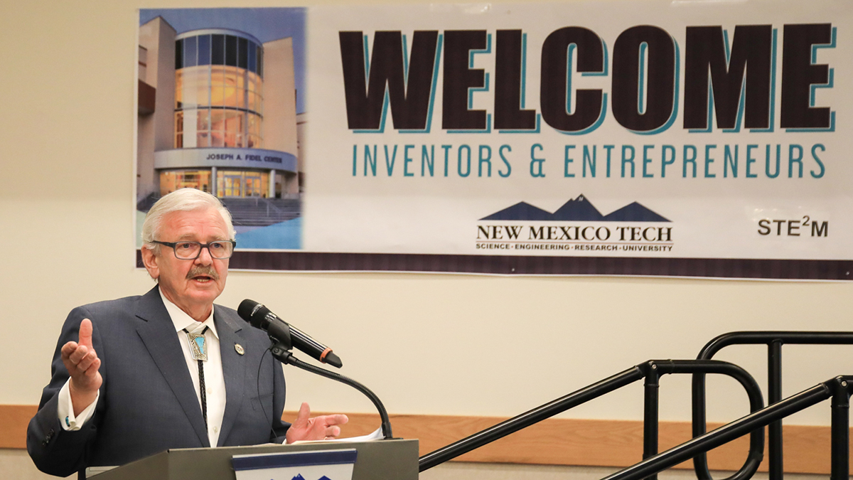 Image of NMT President Stephen Wells speaking to the audience at a previous NMT Inventors Workshop