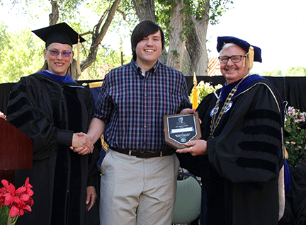 Zac Lawrence with Lorie Liebrock and President Stephen Wells