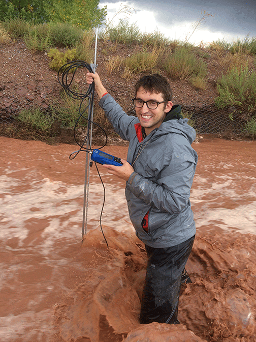 Kyle Stark in a flooded arroyo