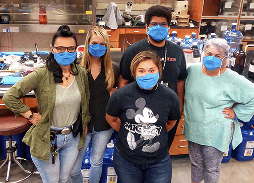 The NMt Biology Department hand sanitizer crew