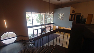 An image of the main stairwell at the entrance of Macey Center.
