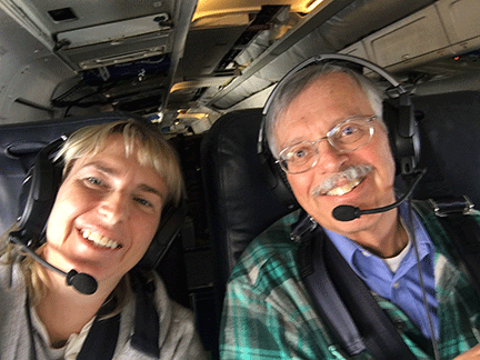 Zeljka Fuchs and Dave Raymond aboard the NSF's Gulfstream V during a previous field campaign