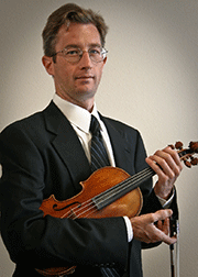 Justin Pollak posed with violin