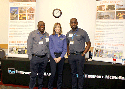 Freeport MacMoRan staff members at their booth