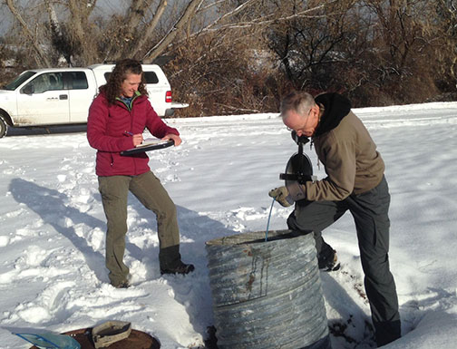 Bureau staffers testing a well near the Animas River