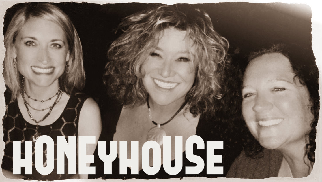Honeyhouse hero banner image showing the three members in the band.